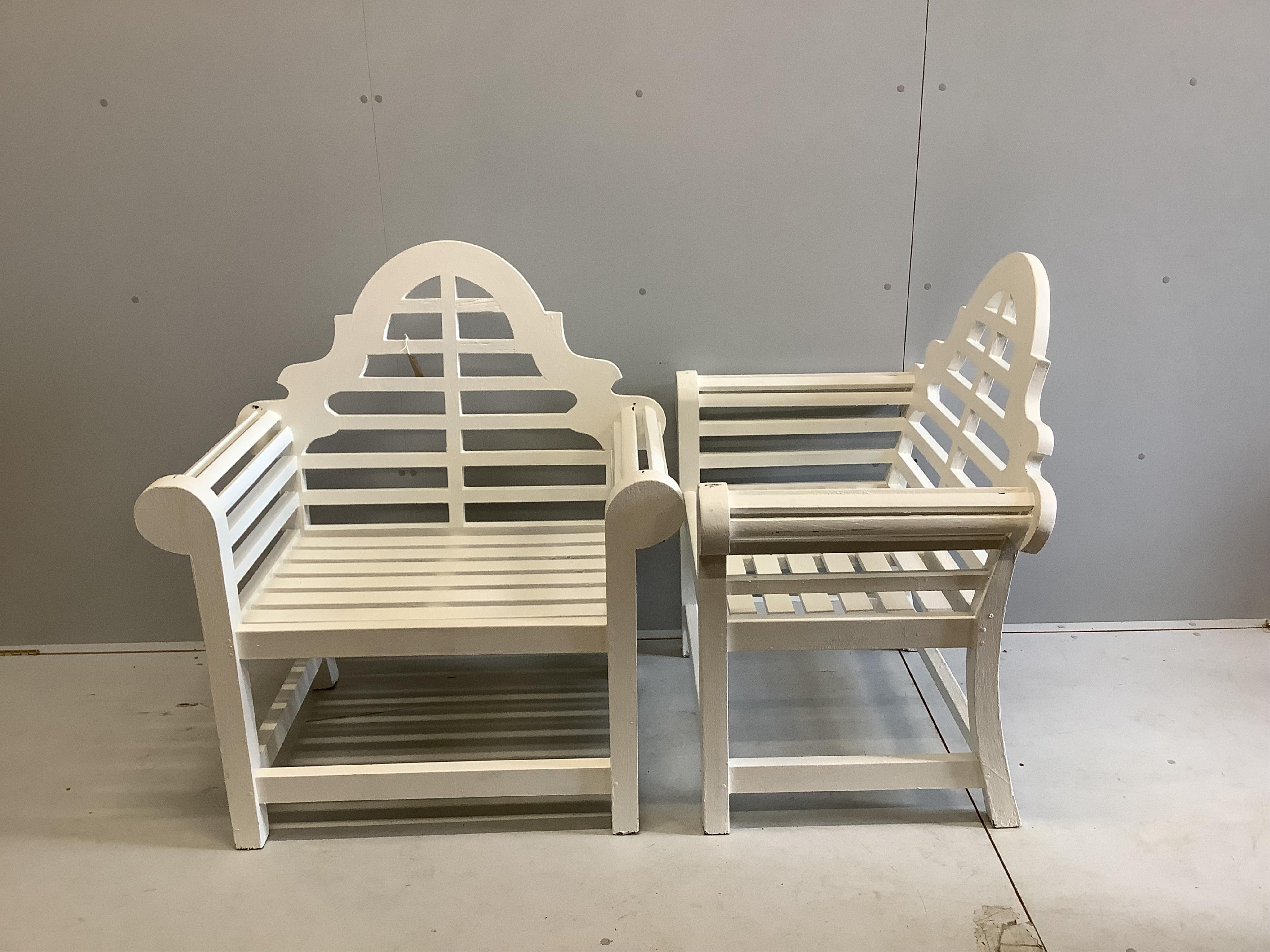 A pair of painted teak Lutyens style garden armchairs, width 93cm, depth 58cm, height 104cm. Condition - good